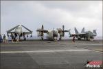 Part 4 in a series aboard an Aircraft Carrier at the end of the deployment sailing from Oahu, Hawaii to San Diego, California with the US Navy. Day 4 includes Carrier ship tours in the Weapons, Operations, and Air Traffic centers of the ship.